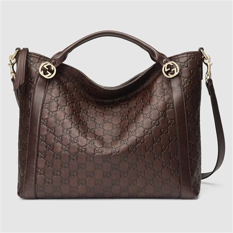 gucci black and brown handbag|Gucci brown leather shoulder bag.